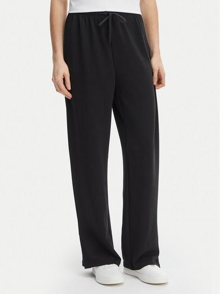 ONLY Spodnie materiałowe Maya 15369156 Czarny Loose Fit. Czarne spodnie materiałowe Only, m, bez wzorów, z materiału. Za 107.99 zł.