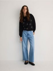 Bawełniana bluza z kokardkami - czarny. Czarne bluzy Reserved, l, bez wzorów, z bawełny, bez kaptura. W wyprzedaży za 39.99 zł.