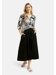 Milano Italy Bluzka w kolorze czarno-beżowym rozmiar: 36. Czarne bluzki Milano Italy, bez wzorów, z wiskozy, bez kołnierzyka, bez ramiączek. Za 173.99 zł.