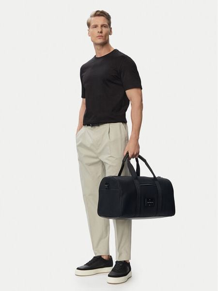 Tommy Hilfiger Torba weekendowa Th Foundation Duffle AM0AM14441 Czarny. Czarne torby podróżne TOMMY HILFIGER, bez wzorów. Za 459.99 zł.