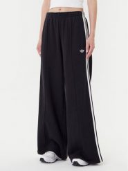 Adidas Spodnie dresowe adicolor 3-Stripes JV7473 Czarny Wide Leg. Czarne spodnie dresowe Adidas, l, bez wzorów, z bawełny. Za 349.99 zł.