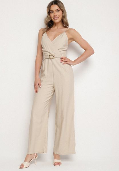 Beżowy Wiskozowy Kombinezon o Kopertowym Kroju na Ramiączkach z Paskiem Medivia. Brązowe sukienki Born2be, na co dzień, m, bez wzorów, z jeansu, bez kołnierzyka, bez ramiączek, kopertowe. Za 179.99 zł.