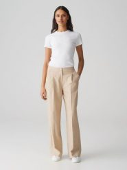 OPUS Spodnie "Maiga" w kolorze beżowym rozmiar: 36. Brązowe spodnie materiałowe Opus, bez wzorów, z materiału, z podwyższonym stanem. Za 165.99 zł.