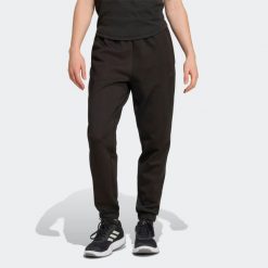 Spodnie fitness damskie ADIDAS. Spodnie materiałowe Adidas, na co dzień, l, bez wzorów, z materiału. Za 269.99 zł.