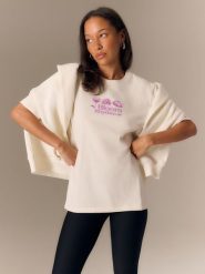 4F T-shirt loose z nadrukiem damski - biały L. Brązowe t-shirty 4f, l, bez wzorów, z materiału, bez kołnierzyka, bez ramiączek. Za 79.99 zł.