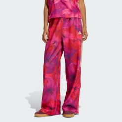 SPODNIE DRESOWE ADIDAS x FARM RIO HOUSE OF TIRO. Białe spodnie dresowe Adidas, bez wzorów, z dresówki, na fitness i siłownię. Za 279.00 zł.