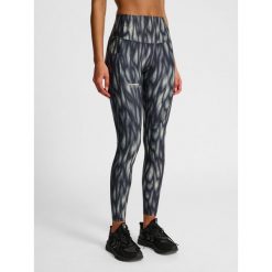 Damskie legginsy Hummel AOP Hiit Intensity. Szare legginsy Hummel, bez wzorów. Za 321.50 zł.