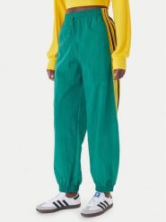 Adidas Spodnie dresowe Sport Santiago KD2971 Zielony Loose Fit. Zielone spodnie dresowe Adidas, l, bez wzorów, z dresówki. Za 349.99 zł.