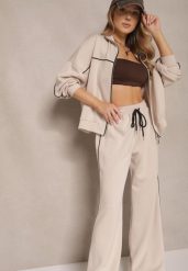 Jasnobeżowy Retro Komplet Dresowy z Wiskozą Bluza i Spodnie o Szerokim Kroju Selriza. Brązowe bluzy Renee, z aplikacjami, z dresówki, bez kaptura. Za 139.99 zł.