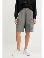 Adidas Bermudy dżinsowe - Loose fit - w kolorze szarym rozmiar: 34. Szare szorty Adidas, bez wzorów, z bawełny, z podwyższonym stanem. Za 140.53 zł.