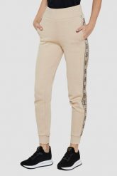 GUESS Beżowe spodnie dresowe damskie Britney, Rozmiar S. Brązowe spodnie dresowe Guess, s, z aplikacjami, z dresówki. W wyprzedaży za 219.99 zł.