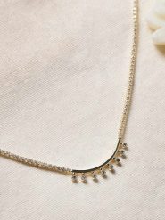 Lodie Silver Pozłacany naszyjnik z cyrkoniami - dł. 42 cm rozmiar: onesize. Szare naszyjniki Lodie Silver, z cyrkonią, metalowe. Za 82.99 zł.