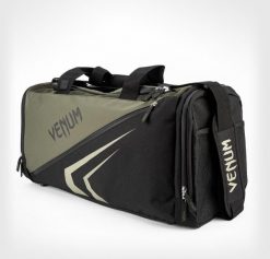 Torba sportowa Venum Trainer Lite EVO. Czarne torby na ramię VENUM, bez wzorów, z materiału, klasyczne, na ramię, duże, bez dodatków. Za 373.43 zł.