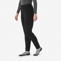 Legginsy trekkingowe damskie polarowe Forclaz MT100. Czarne legginsy QUECHUA, l, bez wzorów, z dzianiny. Za 59.99 zł.
