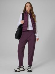 4F Spodnie dresowe damskie - fioletowe XL. Fioletowe spodnie sportowe 4f, xl, bez wzorów, z dresówki, z podwyższonym stanem. Za 159.99 zł.