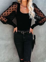 Milan Kiss Bluzka w kolorze czarnym rozmiar: M. Czarne bluzki Milan Kiss, m, bez wzorów, bez kołnierzyka, bez ramiączek. Za 150.95 zł.