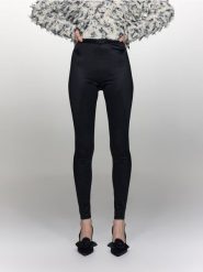 Połyskujące legginsy - czarny. Czarne legginsy Reserved, l, bez wzorów, z dzianiny. W wyprzedaży za 55.99 zł.