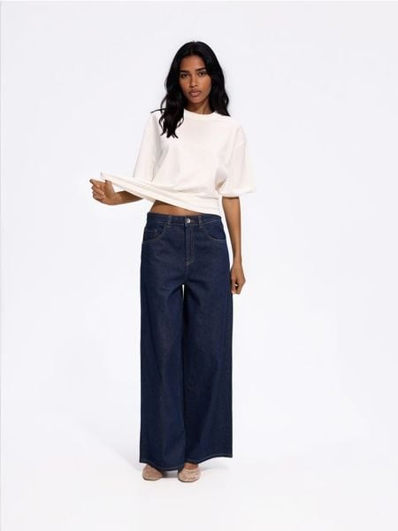 Jeansy baggy - granatowy. Niebieskie jeansy Reserved, bez wzorów. Za 139.99 zł.