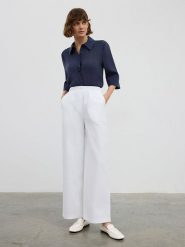 BGN Spodnie w kolorze białym rozmiar: 34. Białe spodnie materiałowe BGN, na co dzień, bez wzorów, z materiału, z podwyższonym stanem. Za 65.99 zł.