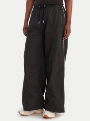 Tommy Jeans Spodnie materiałowe DW0DW22289 Czarny Regular Fit. Czarne spodnie materiałowe Tommy Jeans, xs, bez wzorów, z jeansu. Za 449.99 zł.