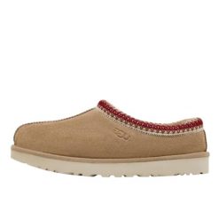 Kapcie Ugg Australian W Tasman Ii Damskie. Brązowe obuwie domowe UGG, bez wzorów, ze skóry, bez zapięcia. Za 695.58 zł.