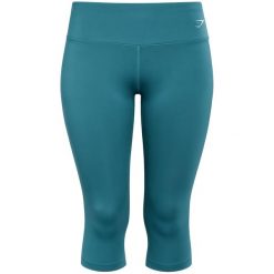 Legginsy treningowe damskie Gymshark Training Cropped. Niebieskie legginsy sportowe Gymshark, bez wzorów, na fitness i siłownię. Za 84.99 zł.