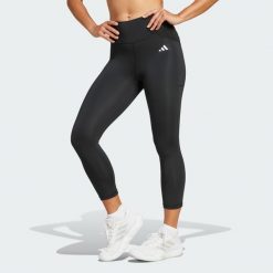 Legginsy Optime Essentials Stash 3/4. Czarne legginsy Adidas, l, bez wzorów, z materiału. Za 179.00 zł.