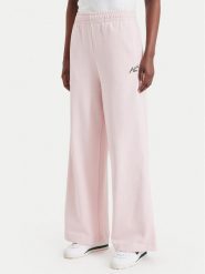Lacoste Spodnie dresowe XF8392 Różowy jasny Regular Fit. Czerwone spodnie dresowe Lacoste, bez wzorów, z bawełny. Za 594.99 zł.