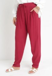 Bordowe Spodnie z Gumką w Pasie i Wsuwanymi Kieszeniami Adantha. Czerwone spodnie materiałowe Born2be, na co dzień, plus size, bez wzorów, z jeansu, plus size. Za 34.99 zł.