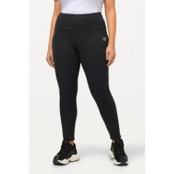 Damskie Legginsy sztuczne futerko od wewnątrz bardzo ciepłe wysoki stan. Czarne legginsy Ulla Popken, plus size, bez wzorów, z bawełny, z podwyższonym stanem. Za 294.99 zł.