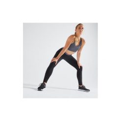 Legginsy fitness kardio damskie 100 czarne. Czarne legginsy DOMYOS, l, bez wzorów, z elastanu. Za 49.99 zł.
