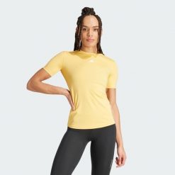 Koszulka damska adidas Techfit. Białe bluzki Adidas, l, bez wzorów, sportowe, bez kołnierzyka, bez ramiączek. Za 157.30 zł.