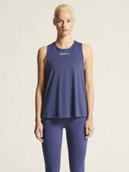 Craft Top sportowy "Core Essence" w kolorze granatowym rozmiar: XS. Niebieskie koszulki sportowe Craft, bez wzorów, z materiału, bez ramiączek, outdoorowe. Za 48.85 zł.