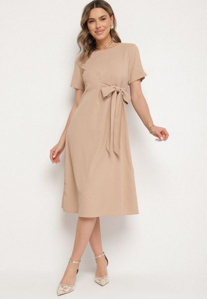 Beżowa Sukienka Vices o Rozkloszowanym Kroju z Ozdobnym Wiązaniem Ellis. Brązowe sukienki Born2be, na co dzień, l, bez wzorów, z jeansu, klasyczne, bez kołnierzyka, bez ramiączek, mini, rozkloszowane. Za 109.99 zł.