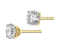 Kolczyki z żółtego złota z brylantami - 0,69 ct - próba 585. Żółte kolczyki Apart, z brylantem, złote. Za 15,990.00 zł.