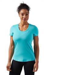 Koszulka treningowa damska Reebok Wor SW Tee. Niebieskie bluzki Reebok, xs, bez wzorów, sportowe, bez kołnierzyka, bez ramiączek. Za 116.00 zł.