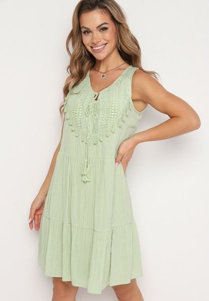 Zielona Rozkloszowana Sukienka na Ramiączkach z Gumką w Pasie i Koronką przy Dekolcie Alorea. Zielone sukienki Born2be, na co dzień, s, bez wzorów, z koronki, bez kołnierzyka, bez ramiączek, mini, rozkloszowane. Za 44.99 zł.