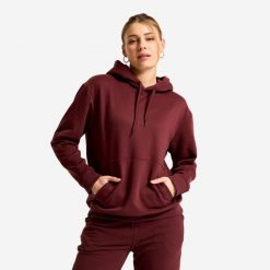 Bluza z kapturem damska Essential. Fioletowe bluzy DECATHLON, l, bez wzorów, z materiału, z kapturem. Za 89.99 zł.