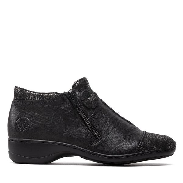 Botki Rieker. Brązowe botki Rieker, bez wzorów, bez obcasa, na płaskiej podeszwie, bez zapięcia. Za 389.99 zł.