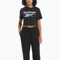 Koszulka Reebok Identity Big Logo Crop Tee. Czarne bluzki REEBOK FITNESS, bez wzorów, sportowe, bez kołnierzyka, bez ramiączek. Za 69.99 zł.