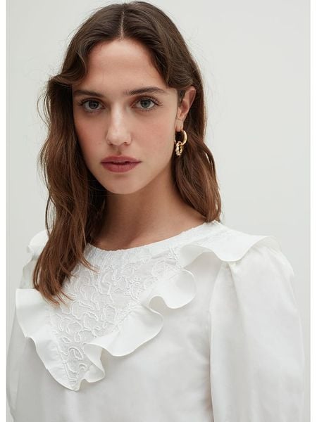 STEFANEL Bluzka w kolorze kremowym rozmiar: 42. Brązowe bluzki Stefanel, bez wzorów, z bawełny, bez kołnierzyka, bez ramiączek. Za 131.12 zł.