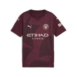 Młodzieżowa koszulka Manchester City 24/25 PUMA Dark Jasper Red. Czerwona bluzki Puma, m, bez wzorów, młodzieżowe, bez kołnierzyka, bez ramiączek. W wyprzedaży za 242.25 zł.