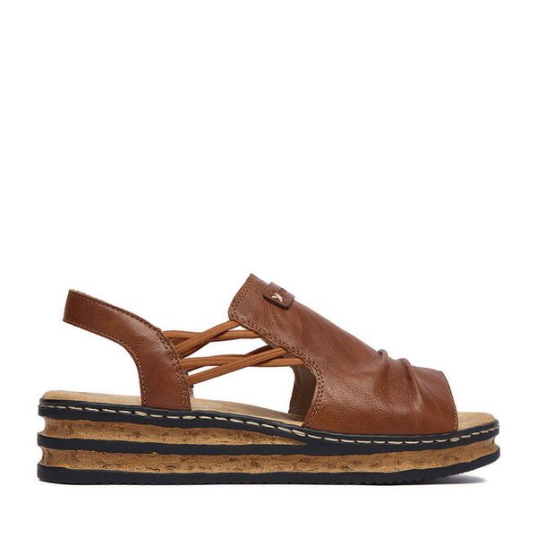 Sandały Rieker. Brązowe sandały Rieker, bez wzorów, bez obcasa, na koturnie, bez zapięcia. Za 299.99 zł.