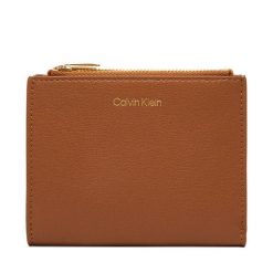 Bilonówka Calvin Klein. Brązowe portfele Calvin Klein, bez wzorów. Za 289.99 zł.