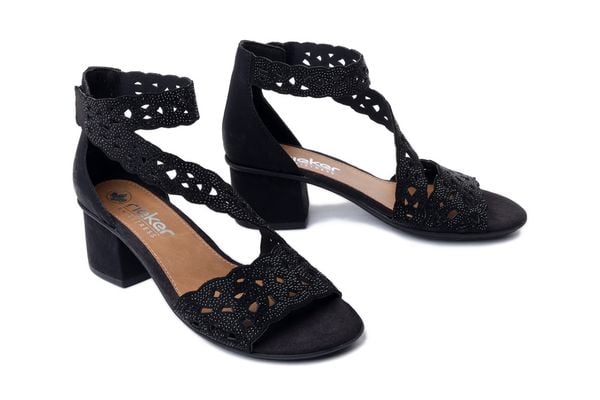 Rieker 64657-00 black, sandały damskie. Czarne sandały Rieker, bez wzorów, ze skóry ekologicznej, bez obcasa, bez zapięcia. Za 237.93 zł.