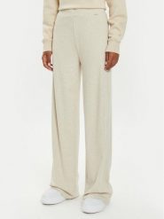 Guess Spodnie dresowe O4BB02 KCHZ2 Beżowy Relaxed Fit. Brązowe spodnie dresowe Guess, xl, z aplikacjami, z bawełny. Za 109.99 zł.