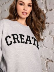 Bluza z napisem - szary. Szare bluzy Sinsay, l, bez wzorów, bez kaptura. W wyprzedaży za 35.99 zł.