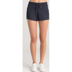 SZORTY Armani Exchange. Szare szorty Armani Exchange, bez wzorów, z materiału. Za 349.00 zł.