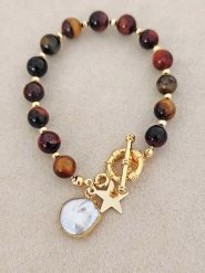 Luja Bijoux Pozłacana bransoletka z tygrysim okiem i perłą rozmiar: onesize. Brązowe bransoletki Luja Bijoux, z perłą, pozłacane. Za 70.95 zł.