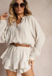 Jasnobeżowy Kombinezon z Bawełny ze Spódnico-Spodenkami i Guzikami oraz Gumką w Talii Vimatthea. Brązowe sukienki Renee, na co dzień, bez wzorów, z bawełny, eleganckie, bez kołnierzyka, bez ramiączek. Za 169.99 zł.